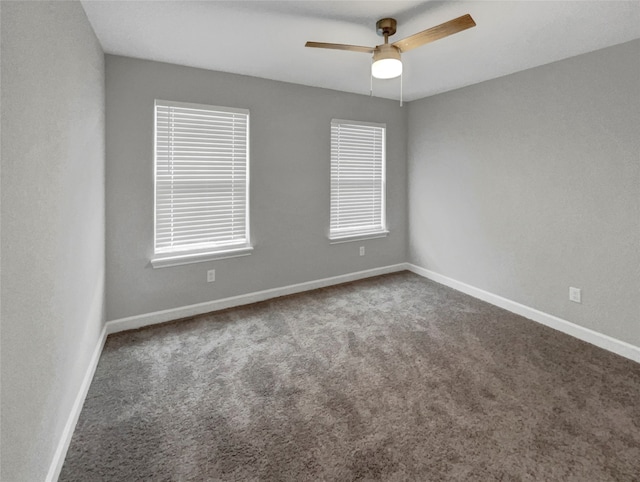 carpeted empty room with ceiling fan