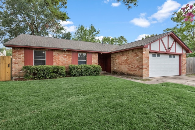 ranch-style house featuring a front yard and a garage