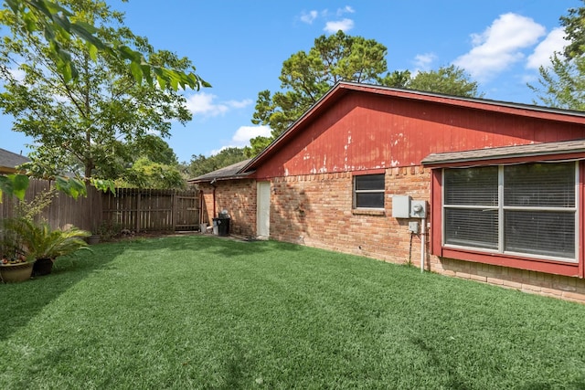 view of property exterior featuring a yard