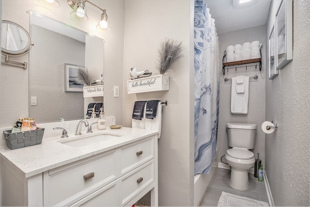 full bathroom featuring shower / bath combination with curtain, toilet, and vanity