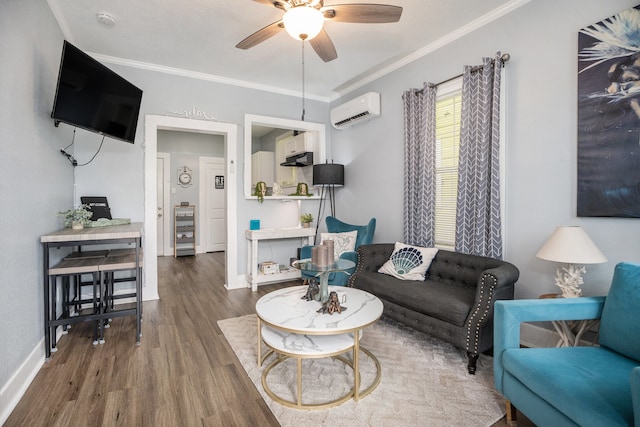 living room featuring a wall mounted AC, ceiling fan, hardwood / wood-style floors, and crown molding