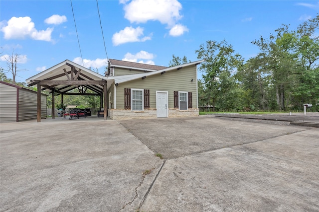 view of home's exterior with a carport