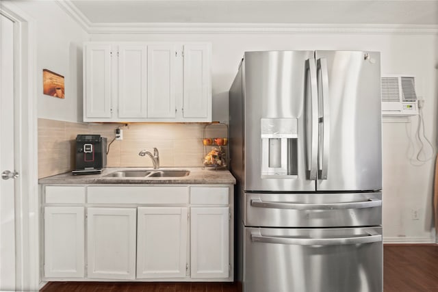 kitchen with crown molding, sink, decorative backsplash, stainless steel fridge with ice dispenser, and white cabinets