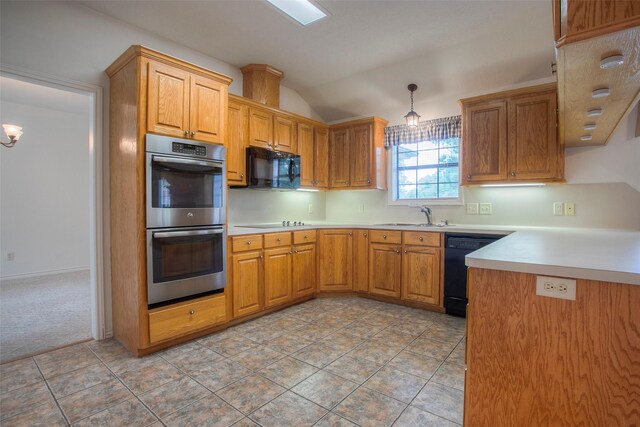 kitchen with hanging light fixtures, tile patterned flooring, sink, lofted ceiling, and black appliances