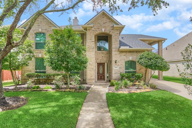 view of front of home with a front yard