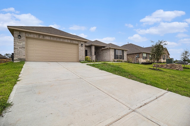 view of front facade with a front lawn and a garage