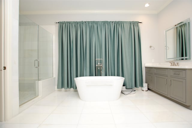 bathroom with crown molding, vanity, independent shower and bath, and tile patterned floors