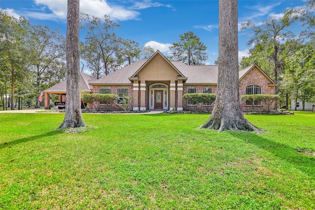 ranch-style house with a front lawn