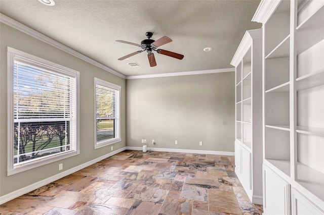 unfurnished room featuring ceiling fan and ornamental molding