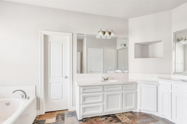 bathroom featuring a bath and vanity