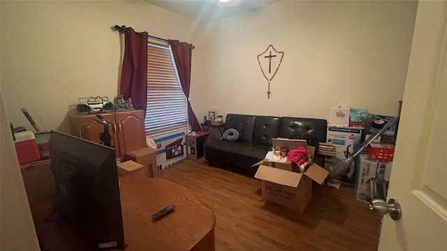 home office with wood-type flooring