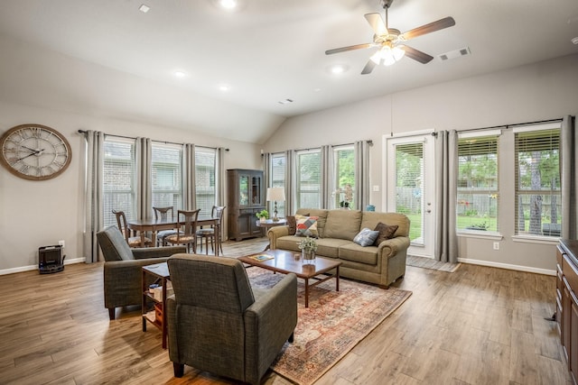 living room featuring recessed lighting, a ceiling fan, visible vents, baseboards, and light wood-type flooring