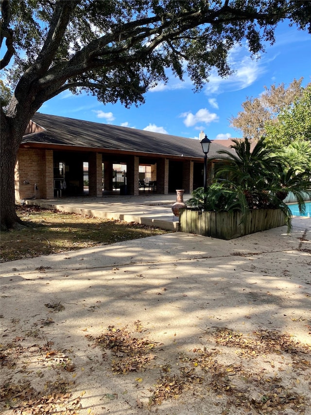 view of front of property with a patio area