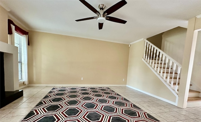 interior space with ceiling fan