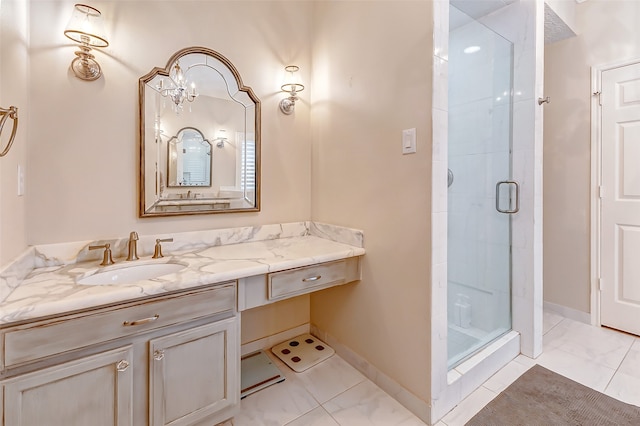 bathroom featuring walk in shower, an inviting chandelier, and vanity