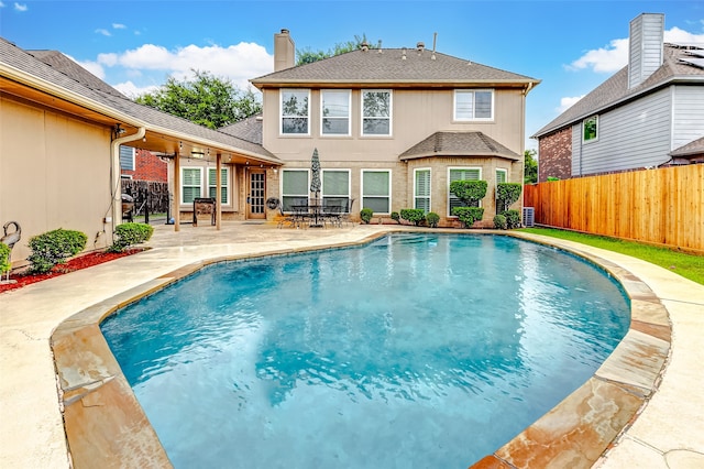 view of pool featuring a patio area