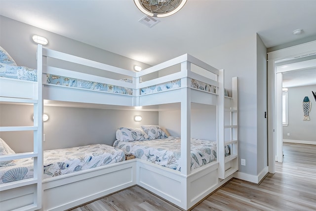 bedroom with light wood-type flooring