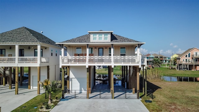 back of property featuring a lawn and a carport