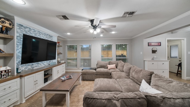 tiled living room with ceiling fan and crown molding