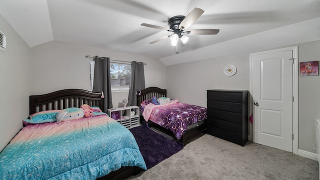 bedroom featuring ceiling fan, lofted ceiling, and light carpet