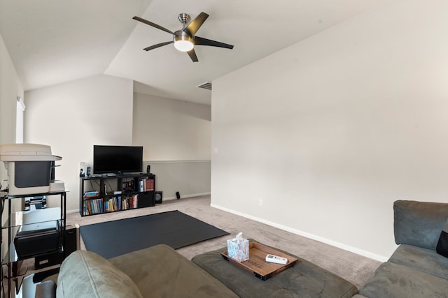 living room featuring vaulted ceiling, ceiling fan, and carpet