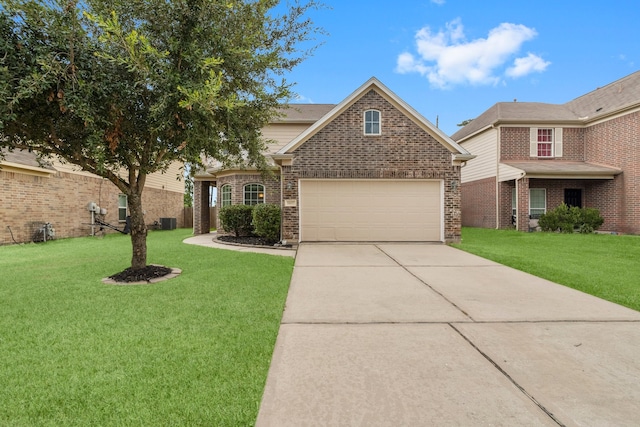 view of front facade with a garage and a front lawn