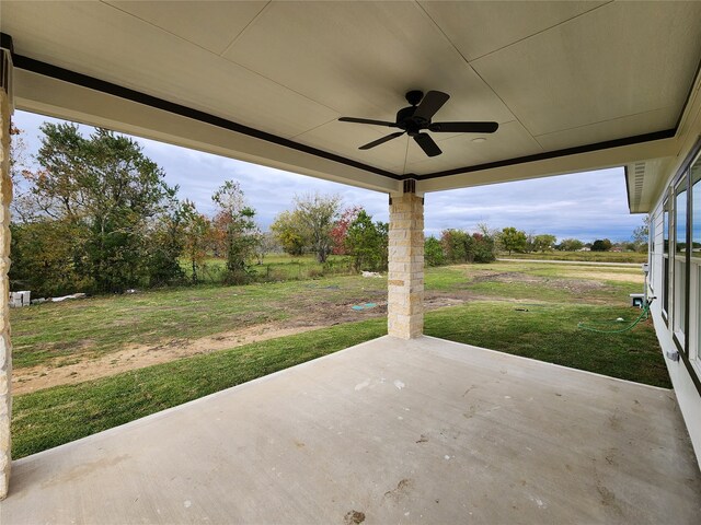 view of patio featuring ceiling fan