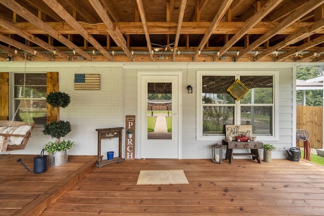 doorway to property with a wooden deck