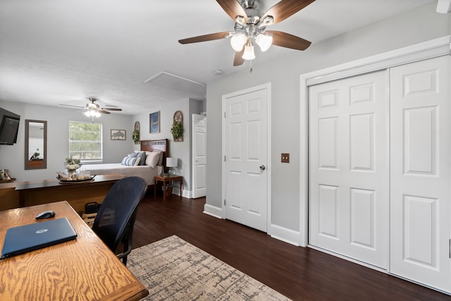 office space featuring dark wood-type flooring and ceiling fan