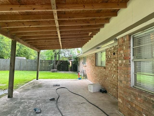 7410 Ashmole Ln, Houston, TX 77088 - fenced backyard featuring a patio