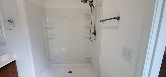 bathroom featuring vanity and walk in shower