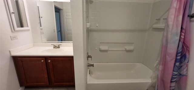 full bathroom with vanity and shower / bath combo