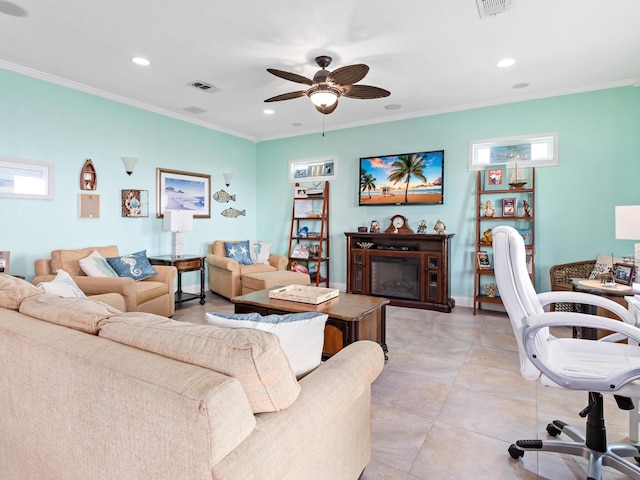 living room featuring light tile patterned floors, ceiling fan, and ornamental molding