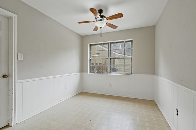 unfurnished room featuring ceiling fan