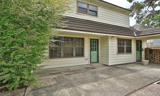 back of house with a patio area