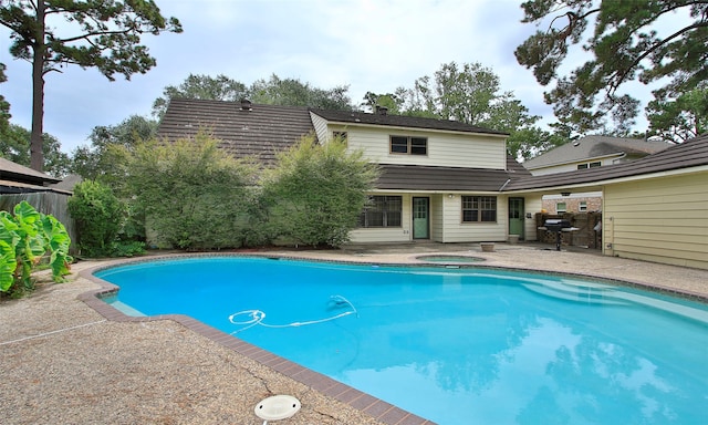 view of swimming pool featuring a patio