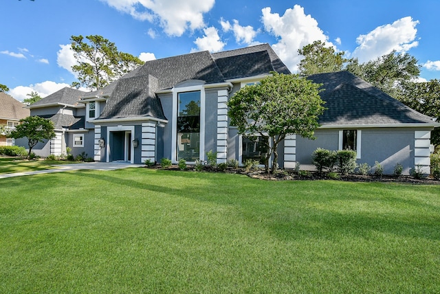 view of front of home with a front lawn