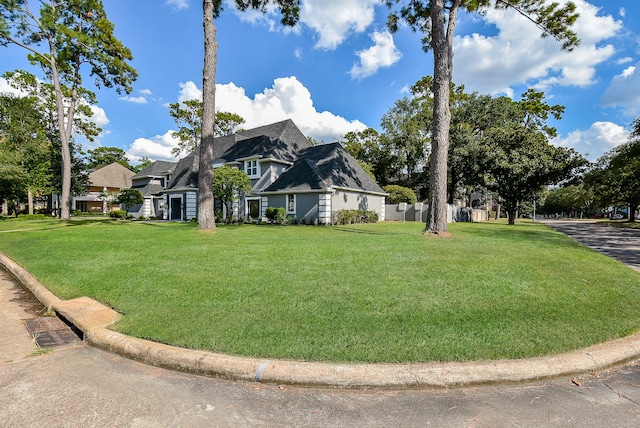 view of home's exterior featuring a yard