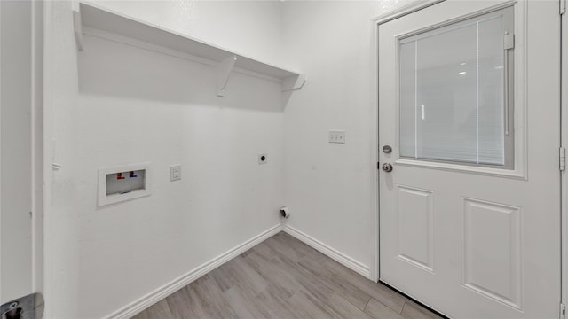 washroom with light wood finished floors, laundry area, hookup for a washing machine, baseboards, and electric dryer hookup