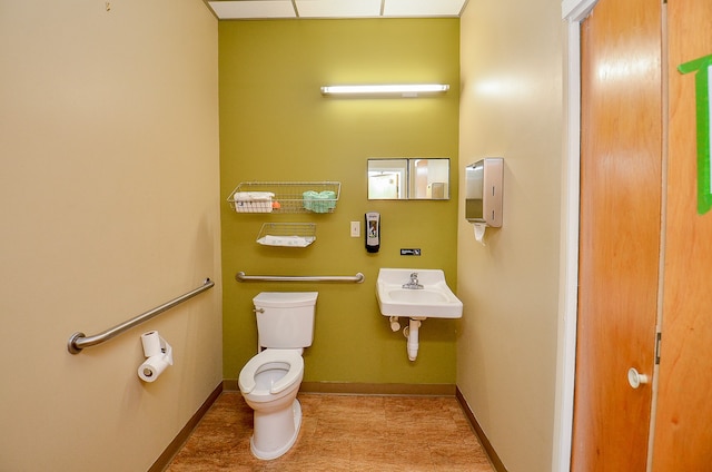 bathroom with toilet and sink