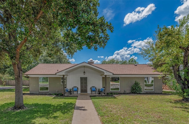 ranch-style house with a front yard