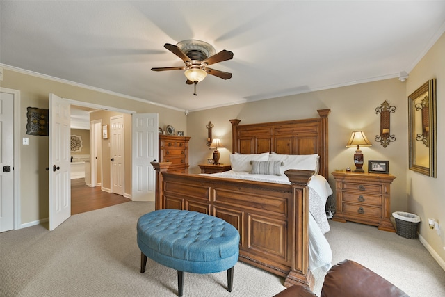 carpeted bedroom featuring ceiling fan and ornamental molding