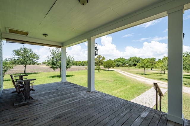 deck featuring a yard