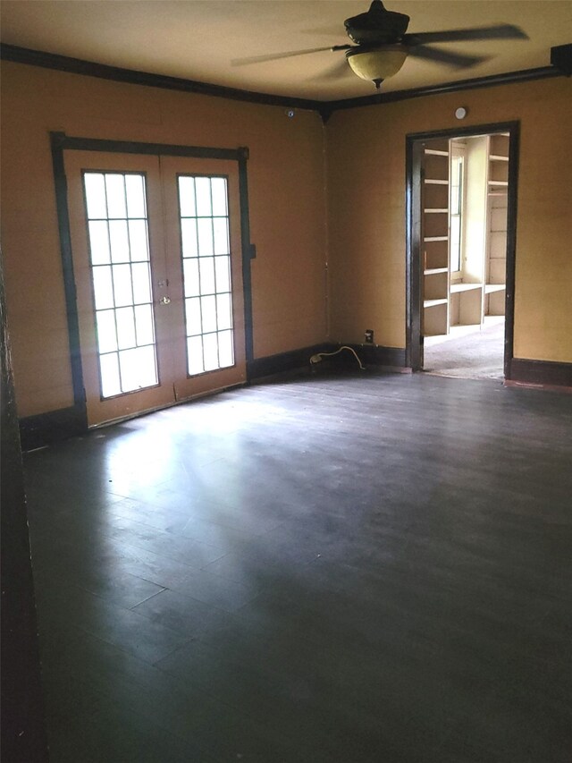 spare room with french doors and crown molding