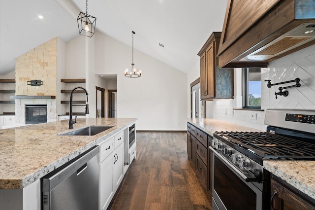 kitchen featuring decorative backsplash, custom exhaust hood, stainless steel appliances, dark wood-type flooring, and white cabinetry