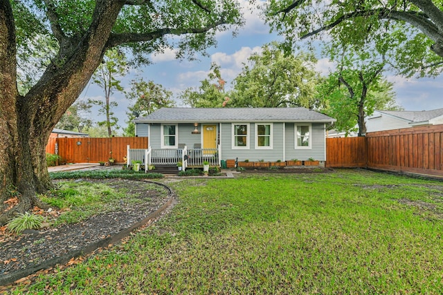 single story home with a front yard