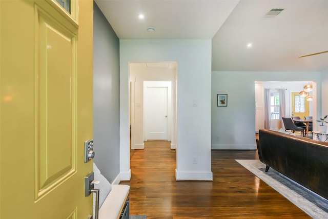 interior space with dark hardwood / wood-style flooring