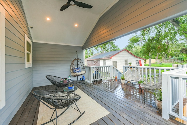 wooden deck with ceiling fan