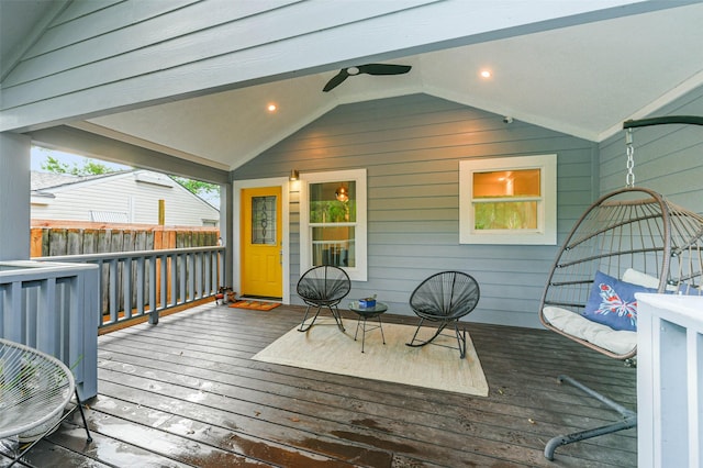 wooden terrace featuring ceiling fan