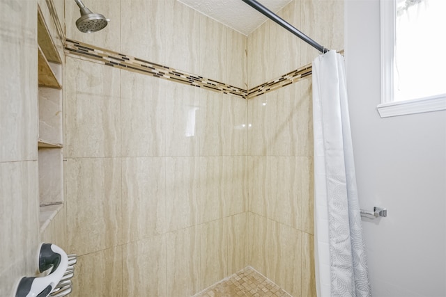 bathroom with a shower with shower curtain